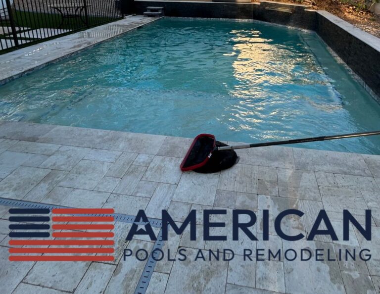 Pool skimming during weekly pool service in Arizona with clear water and routine maintenance