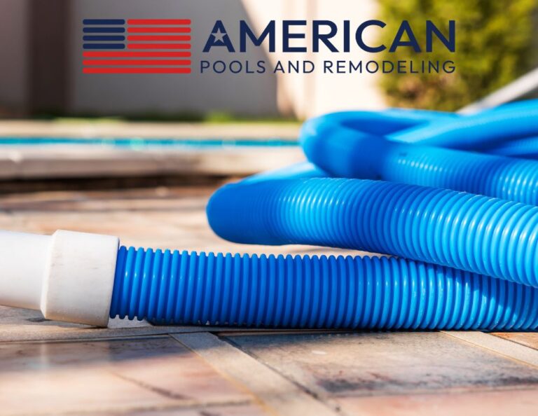 Pool vacuum hose on deck during spring pool preparation in Arizona