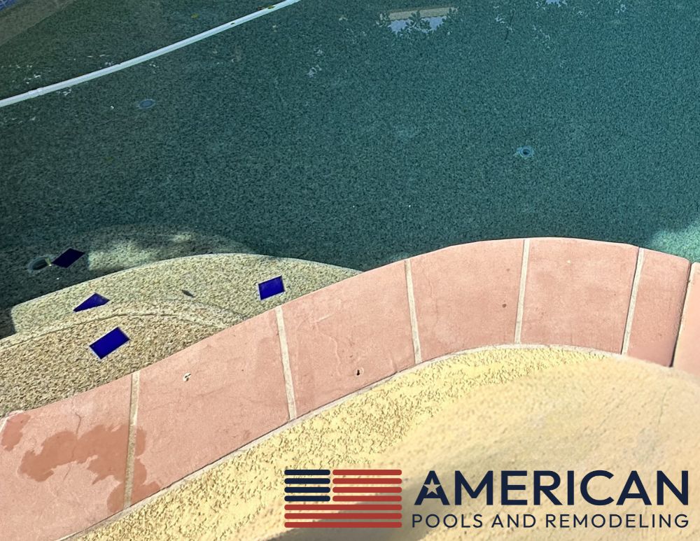 Outdated pool design in Arizona showing an older pool before remodeling with faded plaster, aging waterline tile, and worn cool deck.