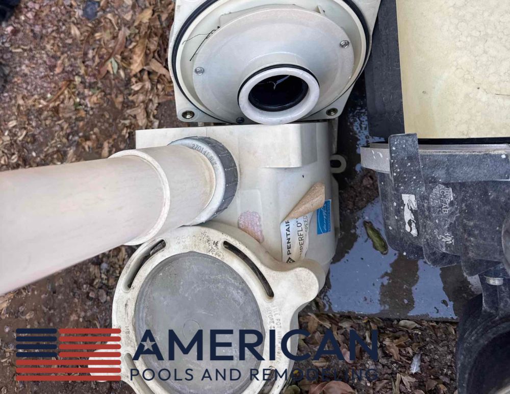 Pool pump with seal plate removed during equipment repair on an Arizona residential swimming pool.