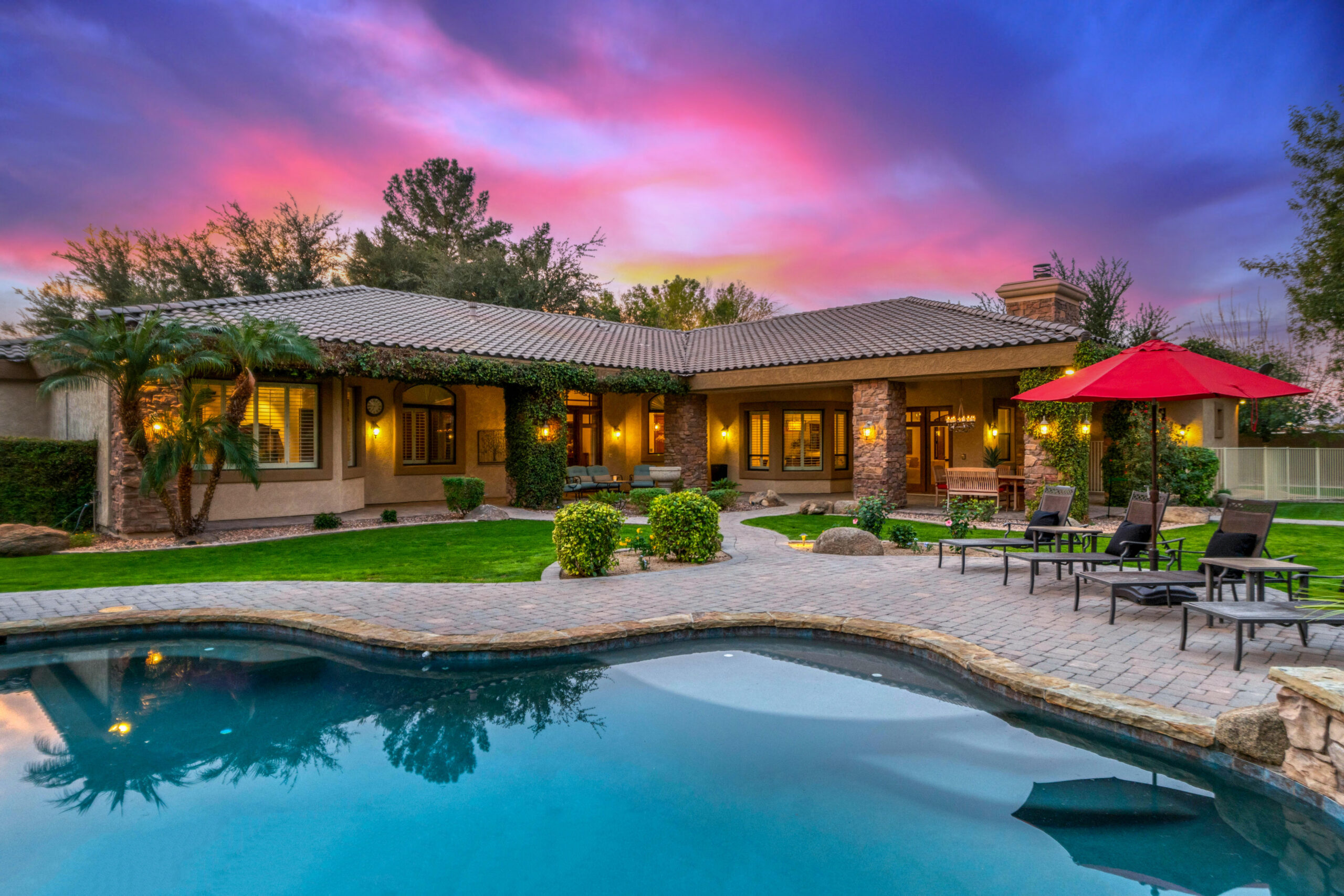 Arizona backyard with swimming pool at sunset