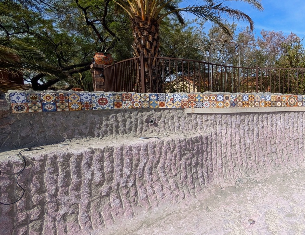 Decorative waterline tile during an Arizona pool remodeling project